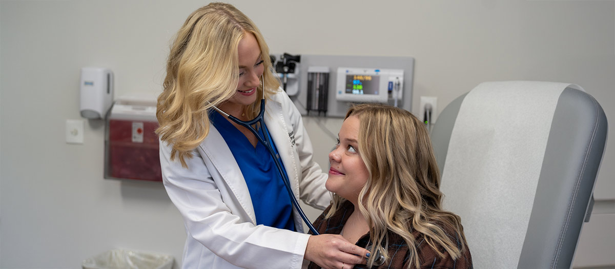 Tanner Provider and Patient Smiling
