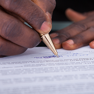 Man filling out form