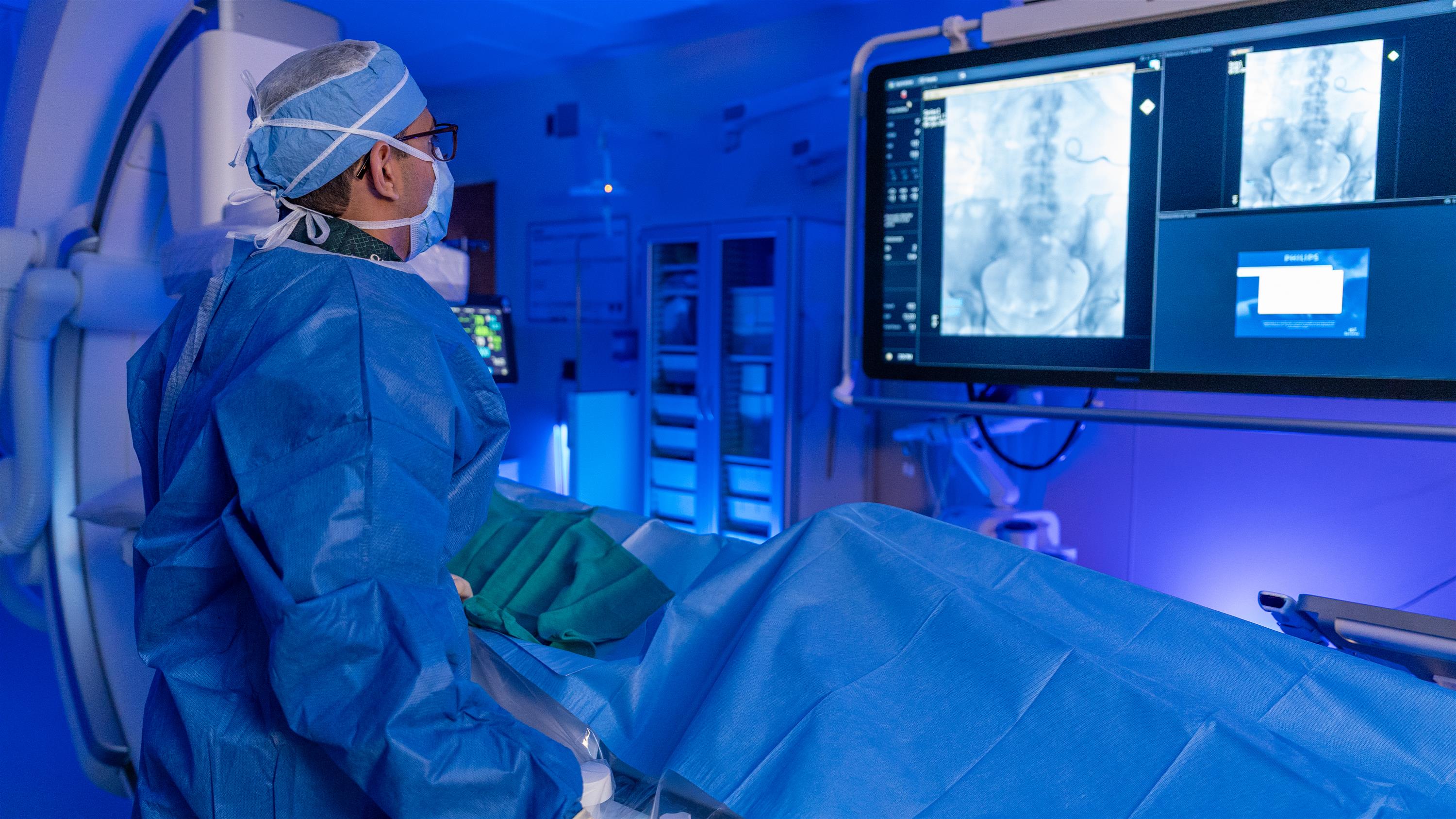 Doctor looking at computer screen