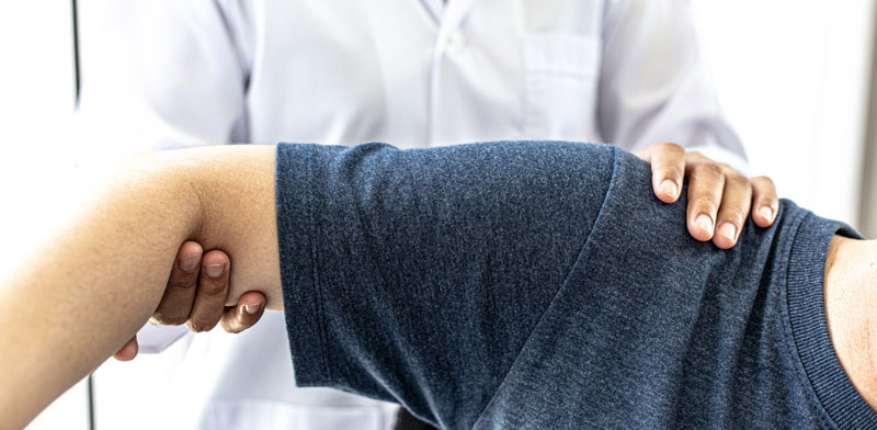 arm-and-shoulder-examination-in-clinic-setting-