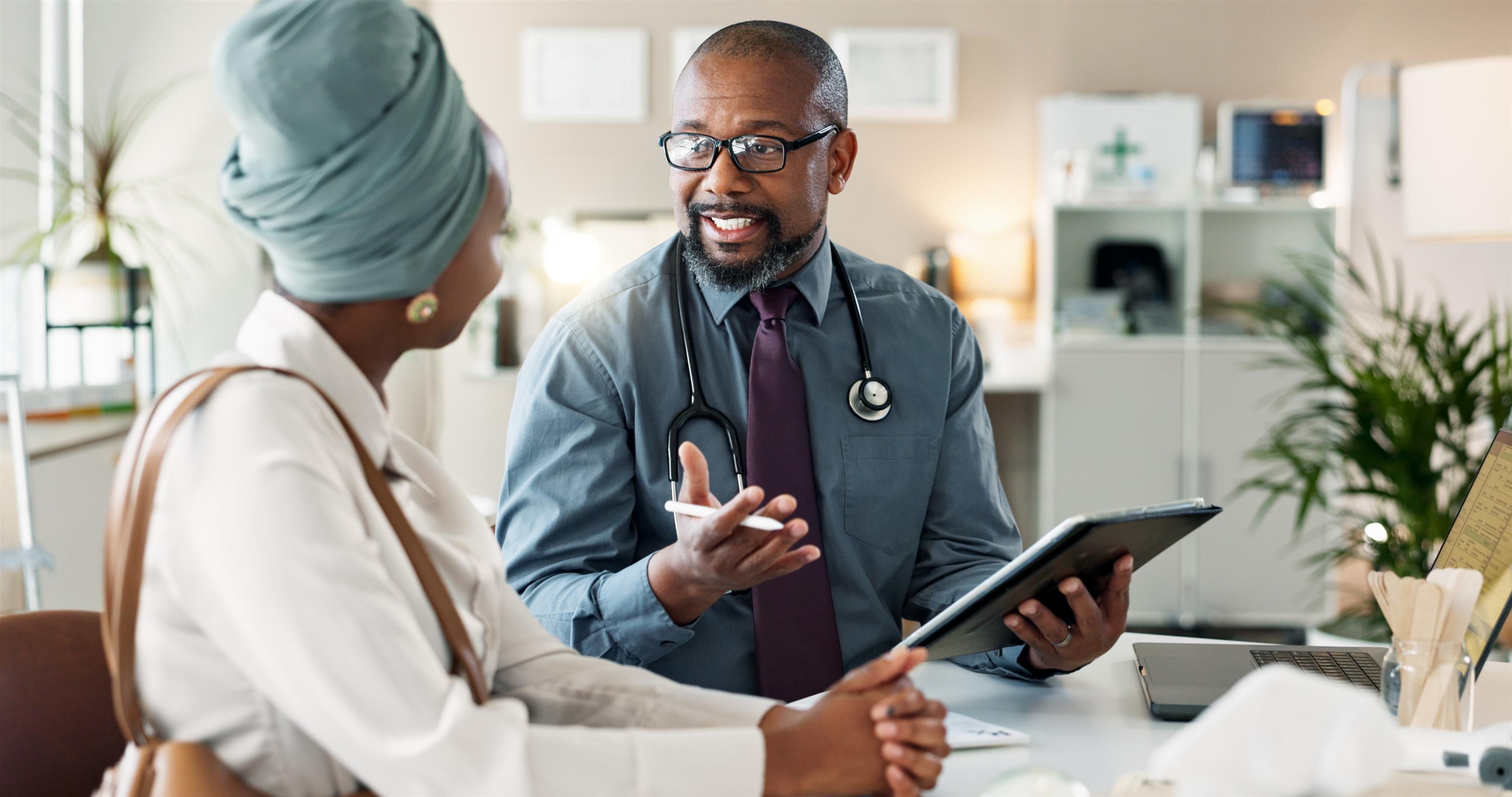 doctor talking to woman
