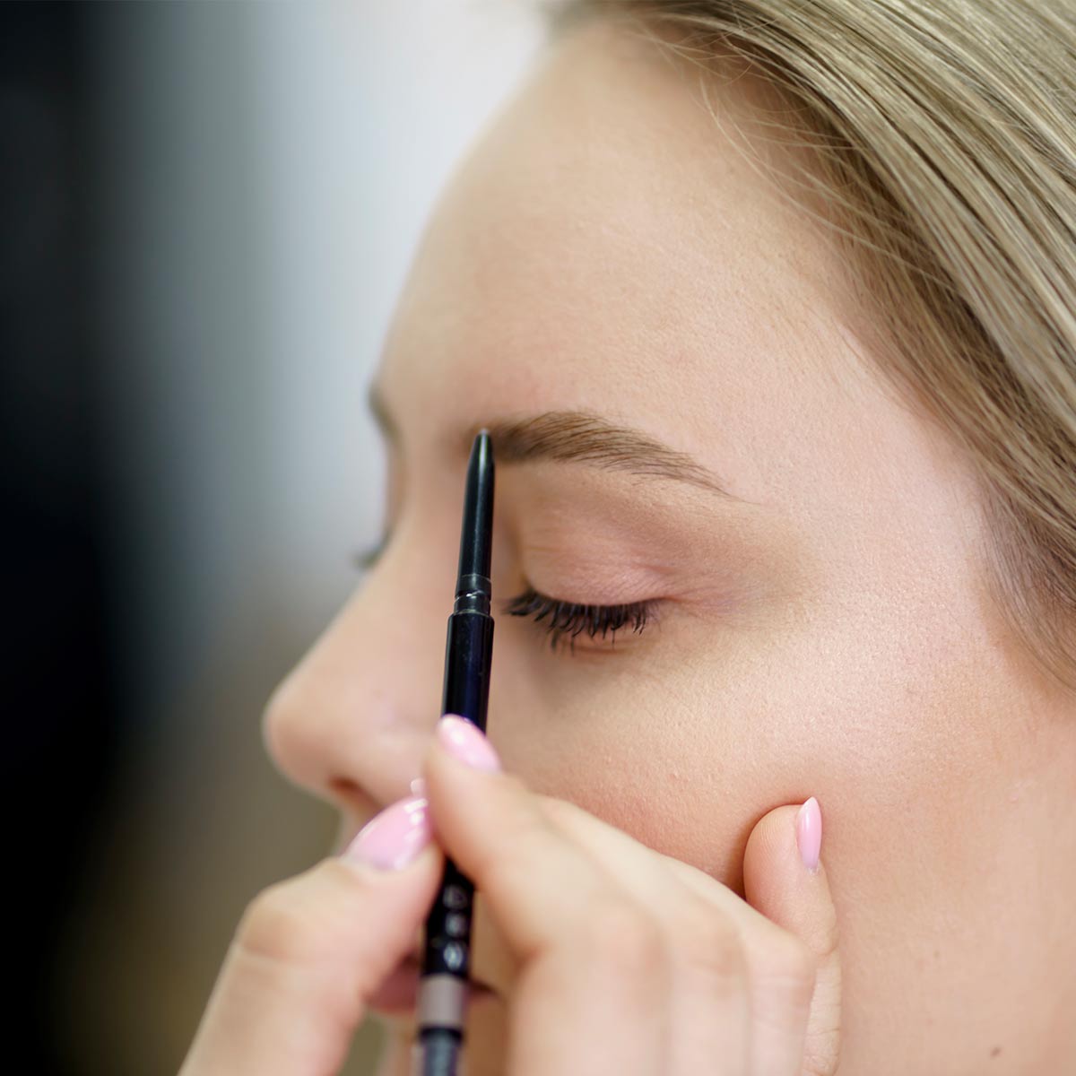 Woman getting a brow list